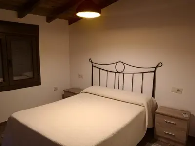 Cama o camas de una habitación en Apartamento Rural La Brígida, Rubiaco, LAS HURDES nº TR-CC-295
