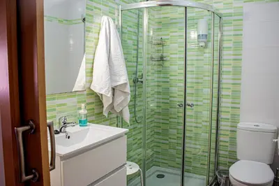 Un baño de Apartamentos Turísticos Domus Aquae