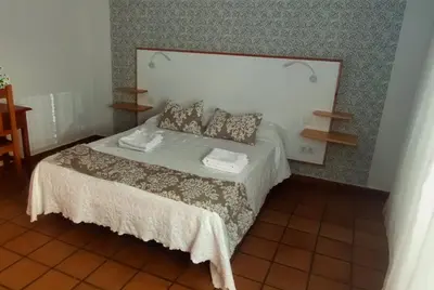 Cama o camas de una habitación en Hostal Altamira Guadalupe
