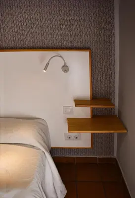 Cama o camas de una habitación en Hostal Altamira Guadalupe