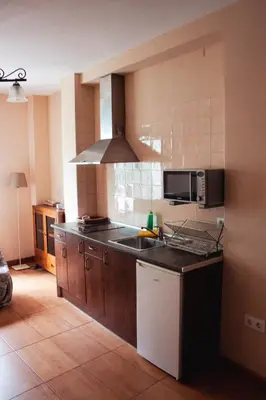 Una cocina o zona de cocina en Apartamentos Rurales La Vera