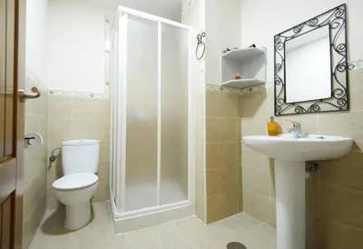 Un baño de Apartamentos Rurales La Vera