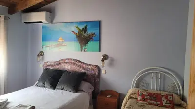 Cama o camas de una habitación en Casa de campo Aires de Gredos