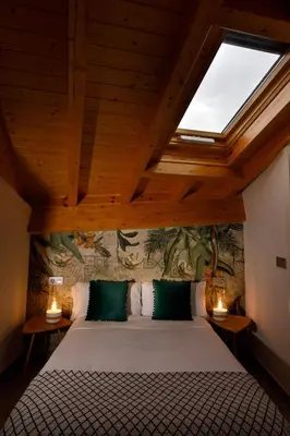 Cama o camas de una habitación en Apartamentos Turísticos Huerto El Horno