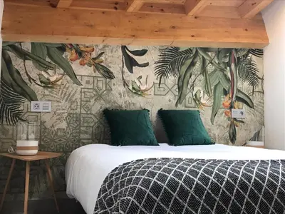 Cama o camas de una habitación en Apartamentos Turísticos Huerto El Horno