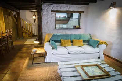 Zona de estar de Casa rural La Tenada