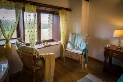 Zona de estar de Casa rural La Tenada