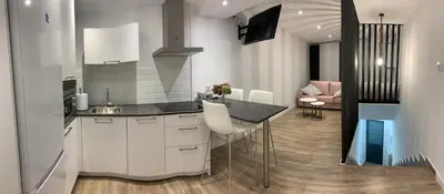 Una cocina o zona de cocina en VUT La Plaza