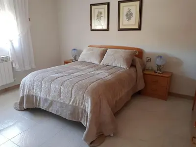 Cama o camas de una habitación en El Patio - Casa de uso turistico