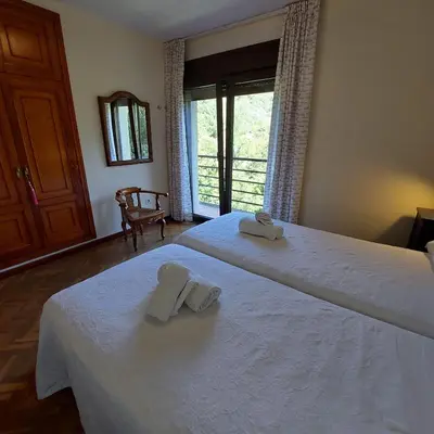 Cama o camas de una habitación en Puente Canto de Gredos