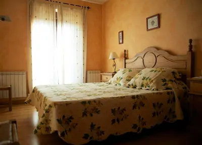 Cama o camas de una habitación en EL MESÓN DE GREDOS