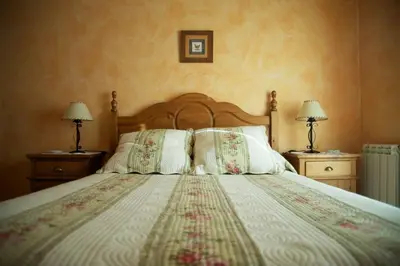 Cama o camas de una habitación en EL MESÓN DE GREDOS