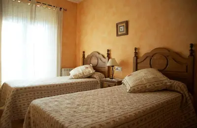 Cama o camas de una habitación en EL MESÓN DE GREDOS
