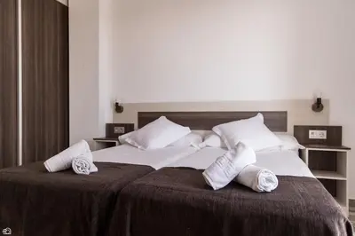 Cama o camas de una habitación en Mesón Hostal La Cabaña