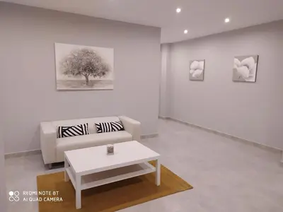 Zona de estar de hostal la taurina