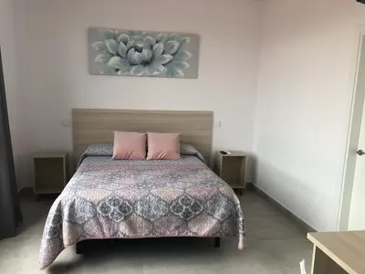 Cama o camas de una habitación en hostal la taurina