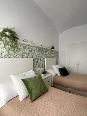 Cama o camas de una habitación en Casa Rural LA CASA DEL AGUA TR-BA-00184