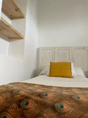 Cama o camas de una habitación en Casa Rural LA CASA DEL AGUA TR-BA-00184
