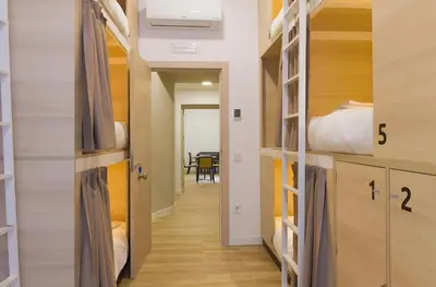 Cama o camas de una habitación en Hostel Casa Vargas Figueroa