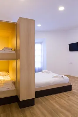 Cama o camas de una habitación en Hostel Casa Vargas Figueroa