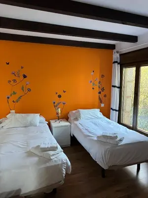 Cama o camas de una habitación en El Roble, casitas rurales
