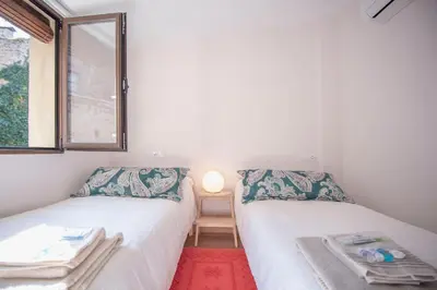 Cama o camas de una habitación en Apartamento Dúplex Casco Antiguo AT Postigo 20