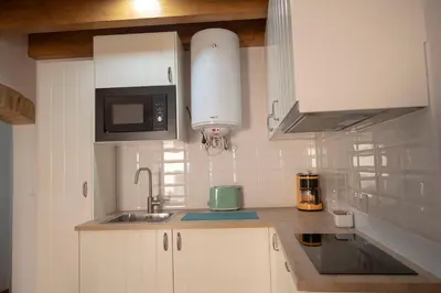 Una cocina o zona de cocina en Apartamento Dúplex Casco Antiguo AT Postigo 20
