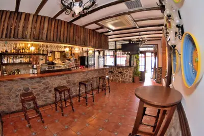 El salón o zona de bar de POSADA EL ARRIERO