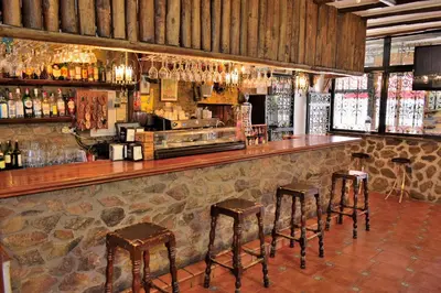 El salón o zona de bar de POSADA EL ARRIERO