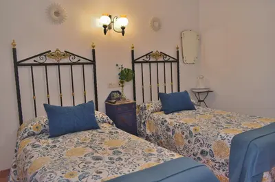 Cama o camas de una habitación en POSADA EL ARRIERO
