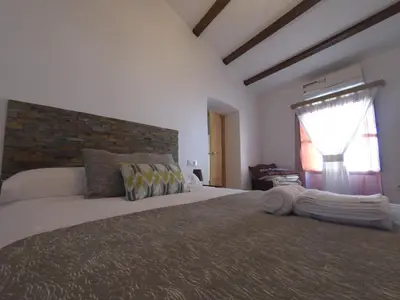 Cama o camas de una habitación en Apartamentos Fuente Nueva II