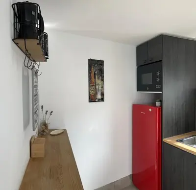 Una cocina o zona de cocina en Apartamento independiente con parking privado gratuito y terraza de ensueño junto al Teatro Romano