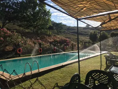Piscina en o cerca de La Alberguería complejo rural