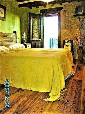 Cama o camas de una habitación en Casa Rural Amparo