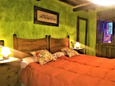 Cama o camas de una habitación en Casa Rural Amparo