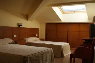 Cama o camas de una habitación en Gran Hotel Balneario