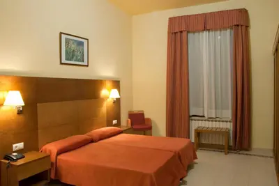Cama o camas de una habitación en Gran Hotel Balneario