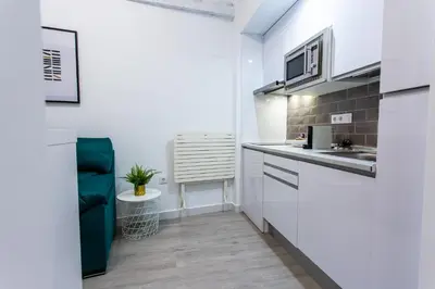 Una cocina o zona de cocina en Apartamentos Hervás Suites