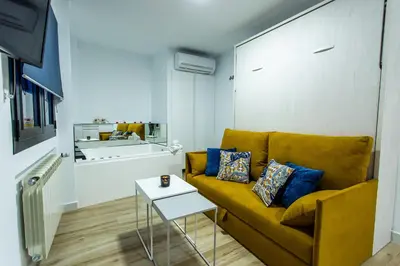 Zona de estar de Apartamentos Hervás Suites