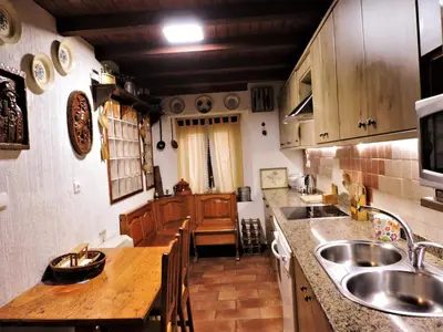 Una cocina o zona de cocina en La Covatilla III
