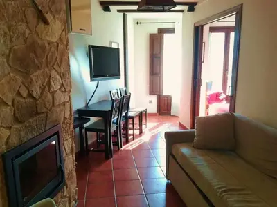Una televisión o centro de entretenimiento en Casa Rural Francia-Quilamas
