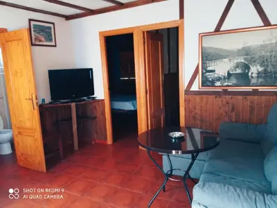 Una televisión o centro de entretenimiento en Complejo Godoy