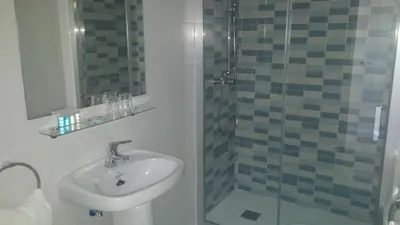 Un baño de Hostal La Despensa de Extremadura