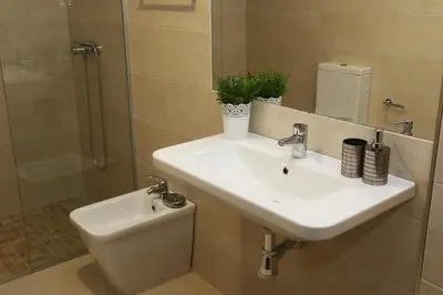 Un baño de Apartamento Turistico Puente Romano P4 2-A