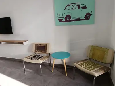 Una televisión o centro de entretenimiento en Apartamento La Machacona TENERIAS