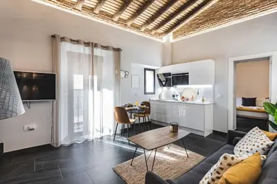Una cocina o zona de cocina en Apartamentos Cáceres Central Suites