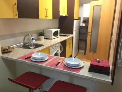 Una cocina o zona de cocina en Apartamentos Turísticos Clavero 2