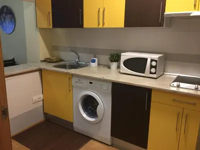 Una cocina o zona de cocina en Apartamentos Turísticos Clavero 2