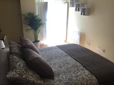 Cama o camas de una habitación en Apartamentos Turísticos Clavero 2