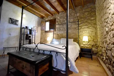 Cama o camas de una habitación en HOTEL RURAL A VELHA FABRICA
